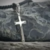 A white gold cross with diamonds