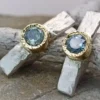 Gold and silver earrings with natural topazes