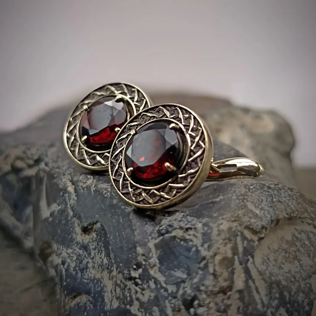 Gold earrings with garnets