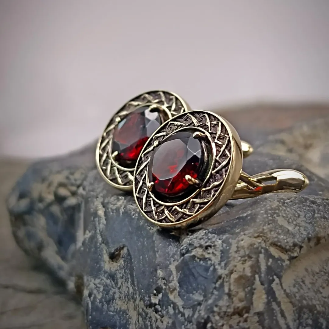 Gold earrings with garnets