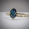 Golden ring with sapphire