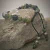 Bracelet with jade, volcanic stones, and silver inserts