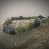 Bracelet with jade, volcanic stones, and silver inserts