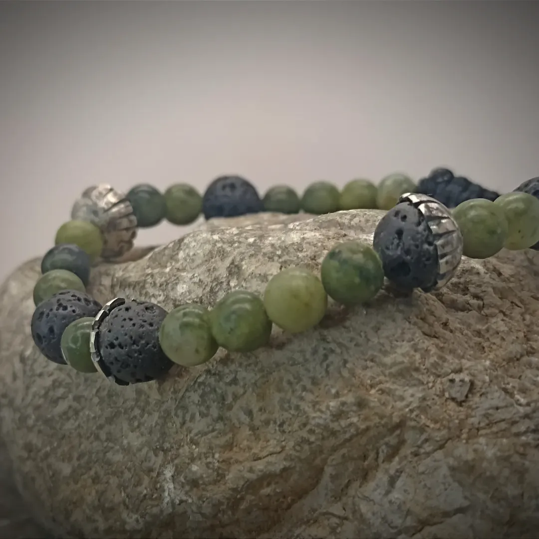 Bracelet with jade, volcanic stones, and silver inserts