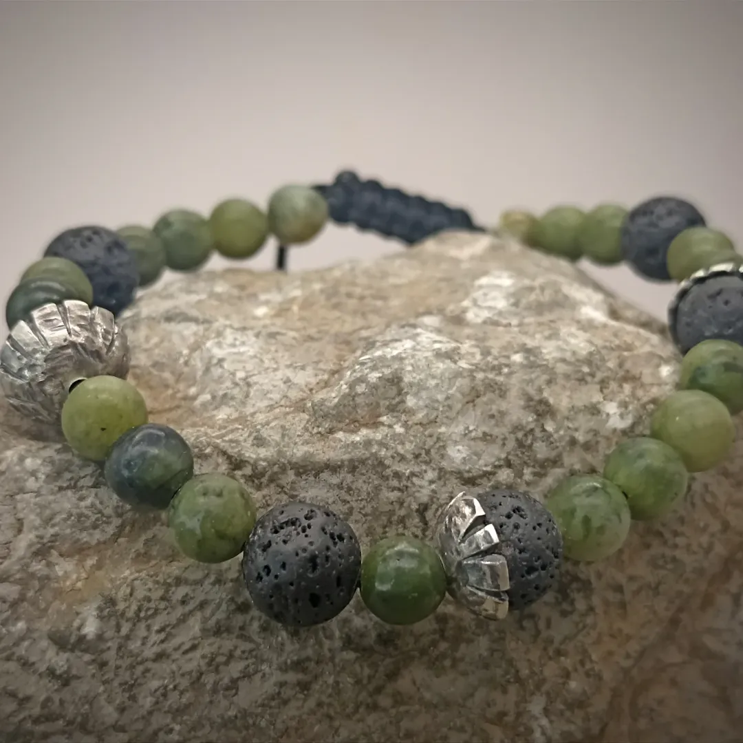 Bracelet with jade, volcanic stones, and silver inserts